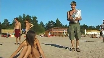 A Young And Stunning Teen Indulges In Beach Activities Without Any Clothing